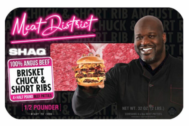 Shaquille O'Neal holding a Shaq Burger