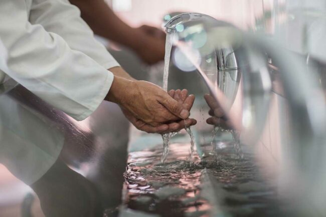 People washing their hands