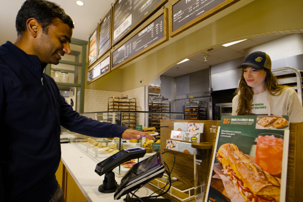 Customers pays through Amazon One at Panera