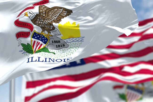 Illinois state flag waving in front of American flag