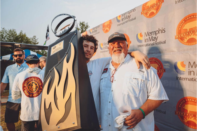 Pitmaster John David Wheeler and son