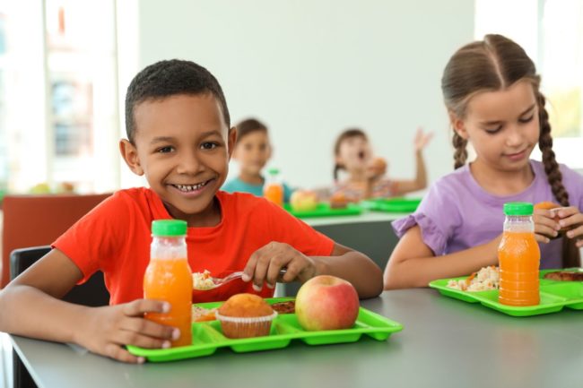 children eating in a cafeteria