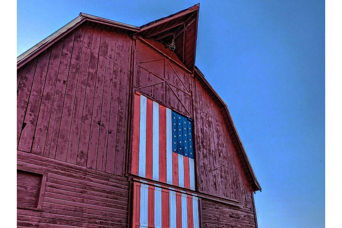 red barn with USA flag